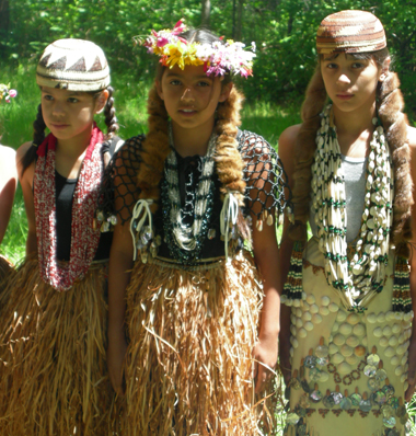 Ty'ithreeha Allen (center) is flanked by Dolli McCovey (left) and Aurelia Robbins (right), participating at a Ihuk Ceremony in 2006.  Ty’ithreeha and Dolli’s maple bark skirts were created by Apprenticeship Program artists Holly Hensher and Paula Pimm Allen.