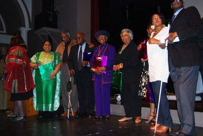 Heritage keepers on stage receiving their acknowledgement.
