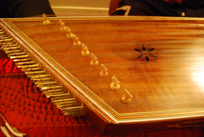 While its Persian name means “one-hundred strings,” the santur has 72 strings of brass and steel over two sets of 9 bridges (or kharak) on each side, resulting in a range slightly over three octaves, and producing 27 diatonic tones.