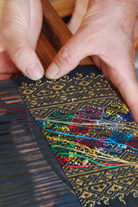 Photo detail of handwoven Laotian textile by ACTA Master artist, Leanne Mounvongkham. Photo by A. Kitchener