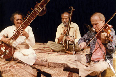 Lifelong friends and collaborators Ravi Shankar (left) and Harihar Rao (middle) are joined by the eminent violinst Yehudi Menhuin, during a recording session for the historic West Meets East series.