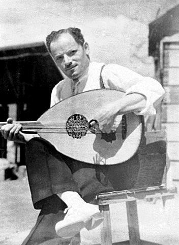 Archie Krotlian playing oud. This photo forms part of a group of field materials documenting Aslanian's Armenian Orchestra performing Armenian and Armeno-Turkish dance music on April 23, 1939, collected by Sidney Robertson Cowell in Fresno, California.