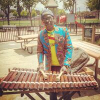 Mohamed prepares to teach a balafon lesson. Photo courtesy of artist