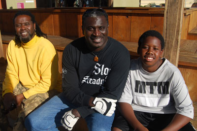 Master hambone percussionist Danny "Slapjazz" Barber (middle), his 2009 apprentice Sekani Thomas (right), and Thomas' father Bernard Yiriba Thomas