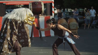 Members of Jun Daiko performing shishimai, or the Japanese lion dance.