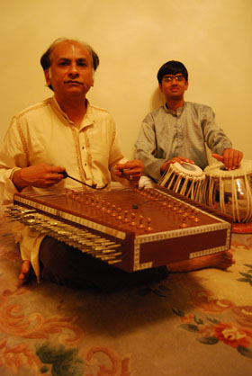 Master artist Arshad Syed (left) and apprentice Vikas Yendluri.