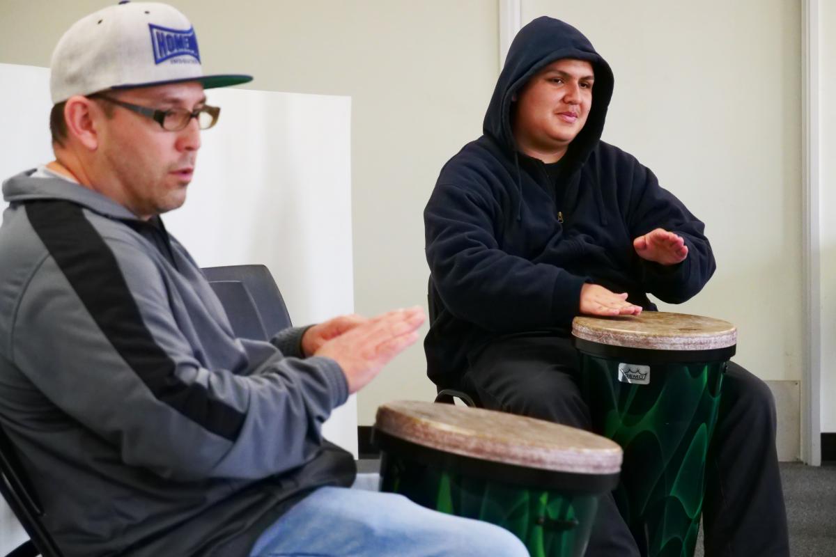 Participants in the Reentry Through the Arts program learning Afro-Colombian drumming at Homeboy Industries. Photo by Shweta Saraswat/ACTA.