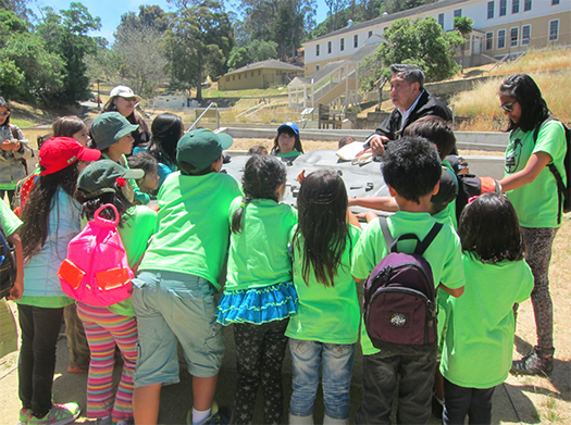 The grandfather of one of our campers explains the conditions of migrants at Angel Island, 2014.