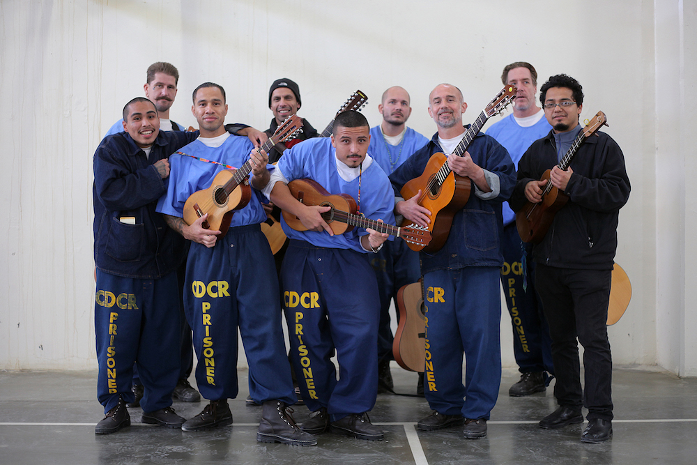 Inmates at Corcoran State Prison participating in a son jarocho workshop facilitated by ACTA. Photo: Peter Merts for the California Arts Council.